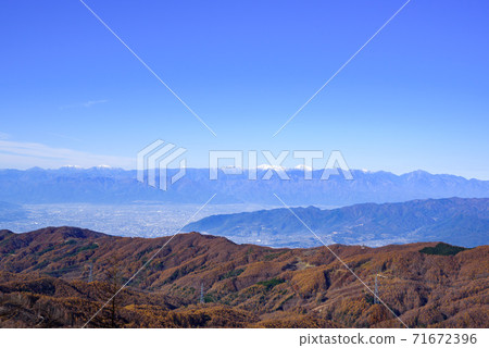 View of Koshu City and the Southern Alps from the Oganazawa Ridge 71672396