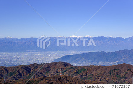 Koshu City and the Southern Alps seen from the Oganazawa Ridge Koshu City and the Southern Alps seen from the Oganazawa Ridge 71672397