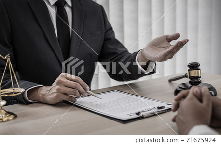 Attorneys or consultants who work in the courtroom are currently investigating the company's corruption cases and have their clients sign legal confirmation, Litigation and justice concept. 71675924