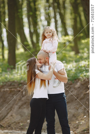 Sports family in a summer forest 71681057