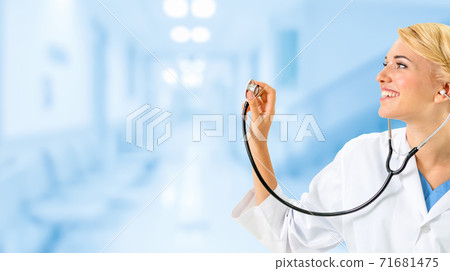Woman doctor working at the hospital office. Woman doctor working at the hospital office. 71681475