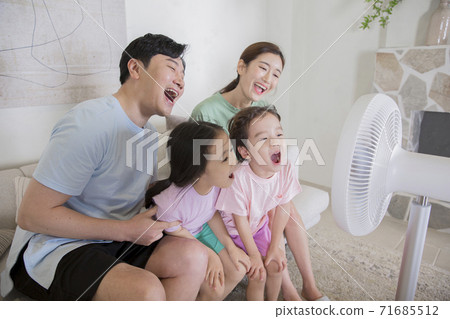 Concept of friendly family, happy family enjoying summer vacation at home 249 71685512