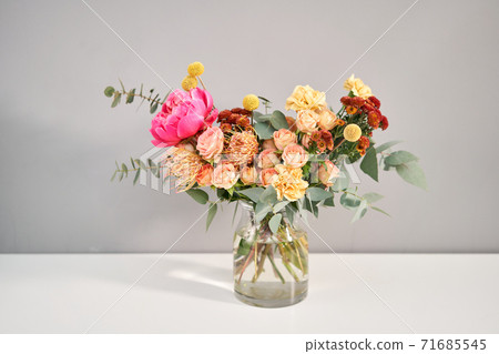 Bouquet 011. Finished flower arrangement in a vase for home. Flowers bunch, set for interior. Fresh cut flowers for decoration home. European floral shop. Delivery fresh cut flower. Bouquet 011. Finished flower arrangement in a vase for home. Flowers bunch, set for interior. Fresh cut flowers for decoration home. European floral shop. Delivery fresh cut flower. 71685545