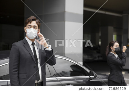 Asian male and female two security guards 049 71686529