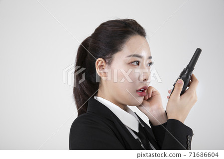 Asian male and female two security guards 116 71686604