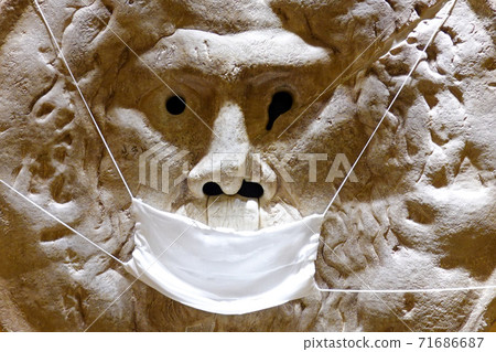 Mouth of Truth with a mask (replica) 71686687