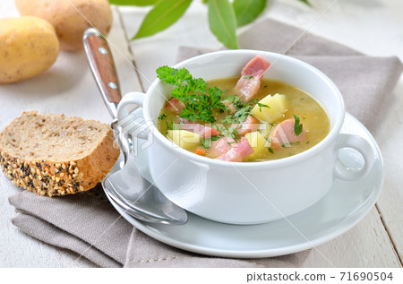 Austrian clear broth with salted sponge mixture, so called schoeberl 71690504