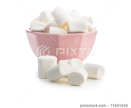 White sweet marshmallows candy in bowl. White sweet marshmallows candy in bowl. 71691836