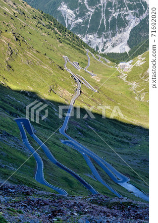 Italy, Stelvio National Park. Famous road to Stelvio Pass in Ortler Alps. 71692020
