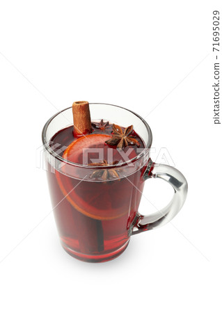 Glass of mulled wine isolated on white background Glass of mulled wine isolated on white background 71695029