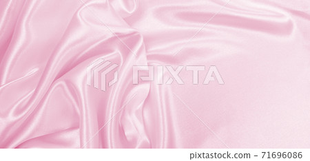 Smooth elegant pink silk or satin texture as wedding background. Luxurious background design 71696086
