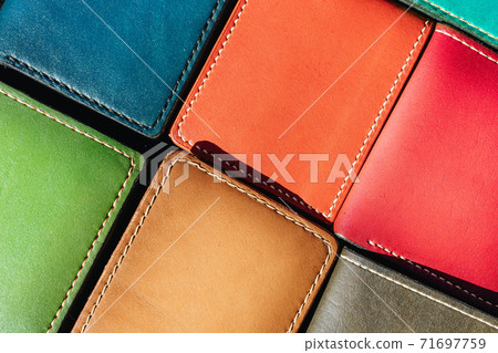 Handmade leather men's wallet. Multi-colored texture. Leather craft Handmade leather men's wallet. Multi-colored texture. Leather craft 71697759