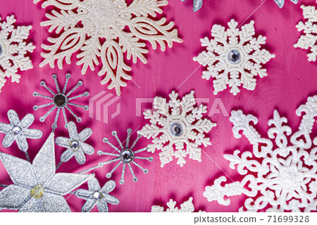 Christmas. Snowflakes on a wooden background. Christmas. Snowflakes on a wooden background. 71699328