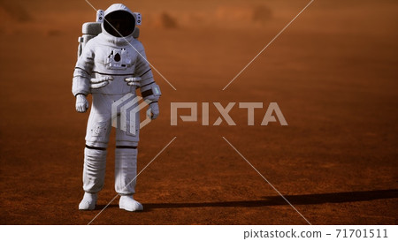 Astronaut on Mars Surface. Red Planet Covered in Gas and rock Astronaut on Mars Surface. Red Planet Covered in Gas and rock 71701511