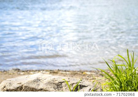 River Bank with sand and small stones River Bank with sand and small stones 71702068