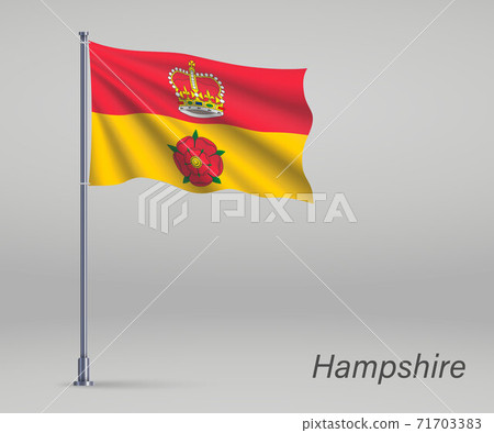Waving flag of Hampshire - county of England on flagpole. Templa Waving flag of Hampshire - county of England on flagpole. Templa 71703383