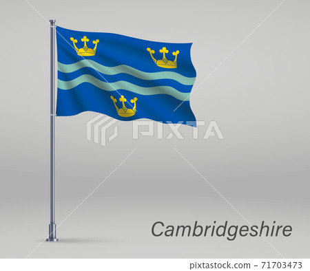 Waving flag of Cambridgeshire - county of England on flagpole. T Waving flag of Cambridgeshire - county of England on flagpole. T 71703473