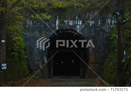 Abandoned railway line walk in late autumn Sangoyama tunnel Abandoned railway line walk in late autumn Sangoyama tunnel 71703573