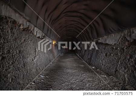 Abandoned railway line walk in late autumn Sangoyama tunnel 71703575