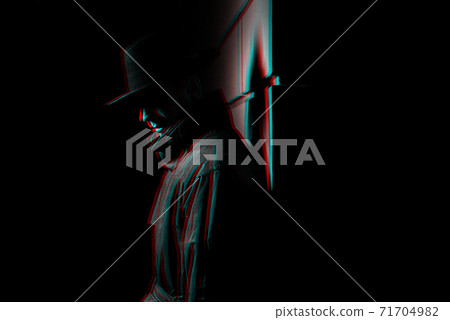 dark silhouette of a man in a raincoat with a hat at night 71704982