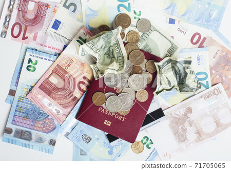 Cash on table isolated: dollars, euro, rubl broken money. All in mess, global crisis . passport travel concept Cash on table isolated: dollars, euro, rubl broken money. All in mess, global crisis . passport travel concept 71705065