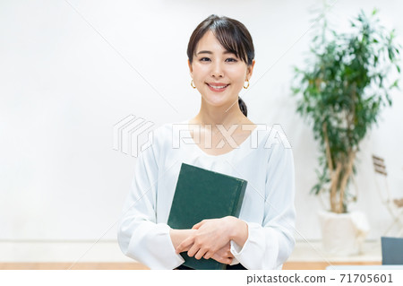 Woman with a book Reading image 71705601