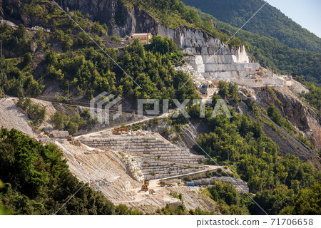 Outdoor Quarry of white Carrara Marble - Apuan Alps Italy 71706658