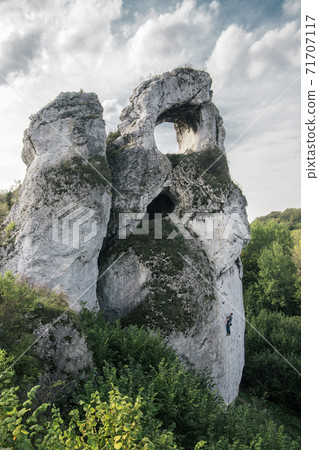 Limestone rocks Okiennik Wielki on Jura Krakowsko-Czestochowska, Silesia, Poland  71707117