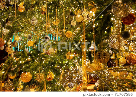 Merry Christmas, Christmas tree and various decorations in gold, red, yellow and green 71707596