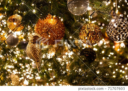 Merry Christmas, Christmas tree and various decorations in gold, red, yellow and green 71707603