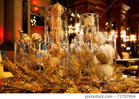 Merry Christmas, Christmas tree and various decorations in gold, red, yellow and green 71707604