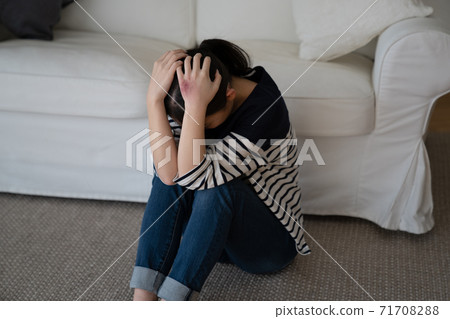 Female image frightened by DV 71708288