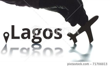 Lagos text, geotag and airplane silhouette, air transport concept Lagos text, geotag and airplane silhouette, air transport concept 71708813
