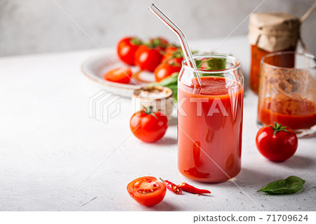 Glass of tomato juice 71709624
