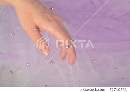 elegant women's hand with elastic fatin fabric organza tulle mesh. 71710731