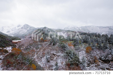 Biei-cho, Hokkaido Snow and autumn leaves of Mochidakedai October Biei-cho, Hokkaido Snow and autumn leaves of Mochidakedai October 71713710