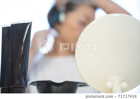 Senior female beauty hair color (out focus) Senior female beauty hair color (out focus) 71717438