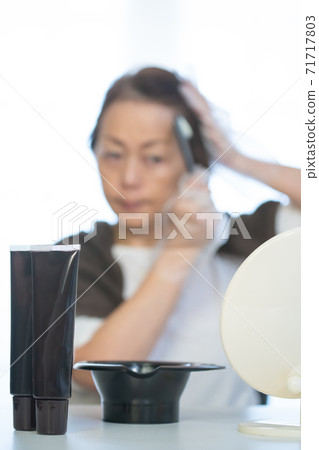 Senior female beauty hair color (out focus) 71717803