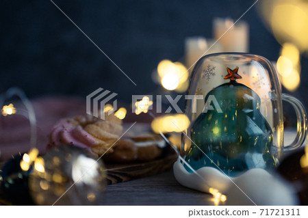 Christmas season treats, donuts, coffee, cocoa, Christmas trees, glasses Christmas season treats, donuts, coffee, cocoa, Christmas trees, glasses 71721311