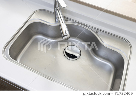 Stainless steel sink in the kitchen Stainless steel sink in the kitchen 71722409
