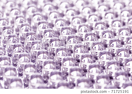 Straight rows of LEDs in the panel close-up macro. Blue neon glow 71725191