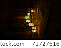 Vintage wall lamp with eastern ornates on it. 71727616