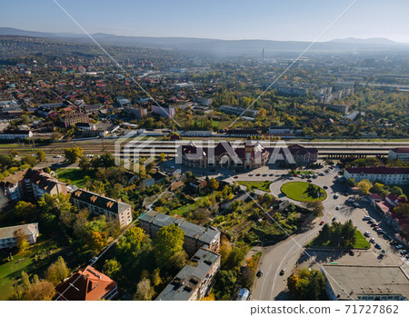 Uzhgorod railway station city landscape with houses roofs in Zakarpattya Ukraine Uzhgorod railway station city landscape with houses roofs in Zakarpattya Ukraine 71727862