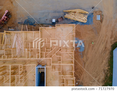 Beam of new house with wooden frame under construction. Beam of new house with wooden frame under construction. 71727970