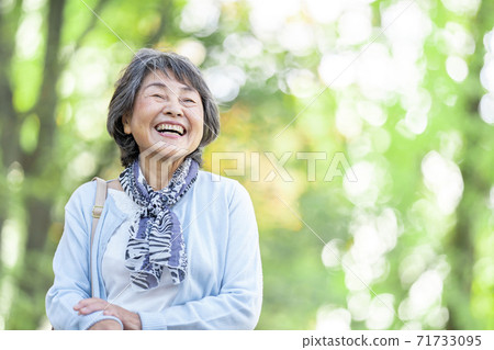 Senior woman fresh green image 71733095