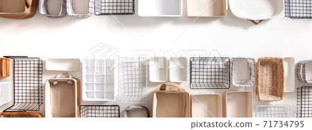 Top view of closet organization boxes and steel wire baskets in different shapes. Top view of closet organization boxes and steel wire baskets in different shapes. 71734795