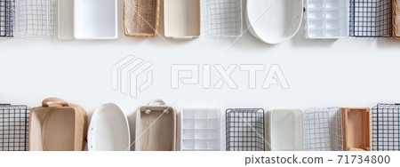 Top view of closet organization boxes and steel wire baskets in different shapes. 71734800