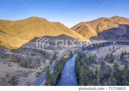 mountain river aerial view in sunset light 71738603