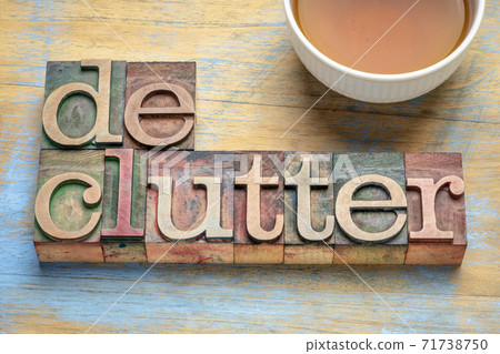 declutter word in wood type - minimalism concept declutter word in wood type - minimalism concept 71738750
