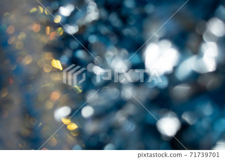 Abstract blurred gold background with beautiful bokeh effect. Abstract blurred gold background with beautiful bokeh effect. 71739701